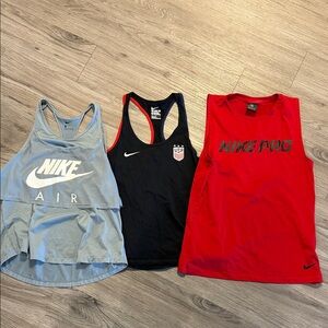Bundle of Nike tanks